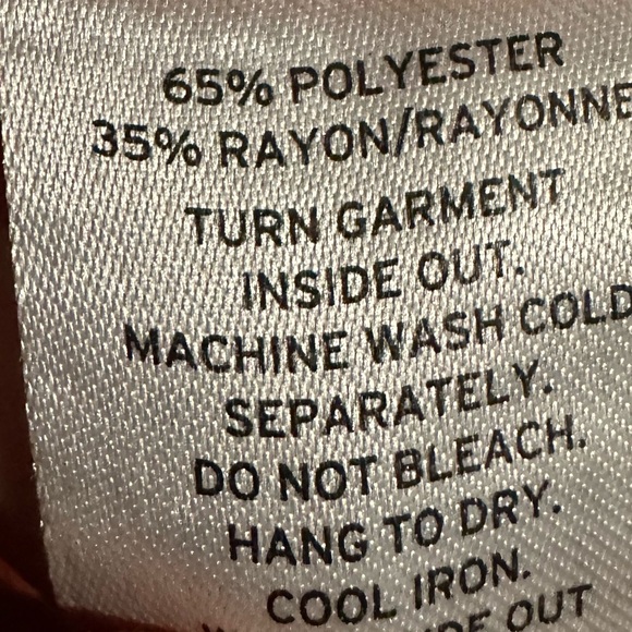 Orange shirt with lined detail on front. π - Picture 7 of 7